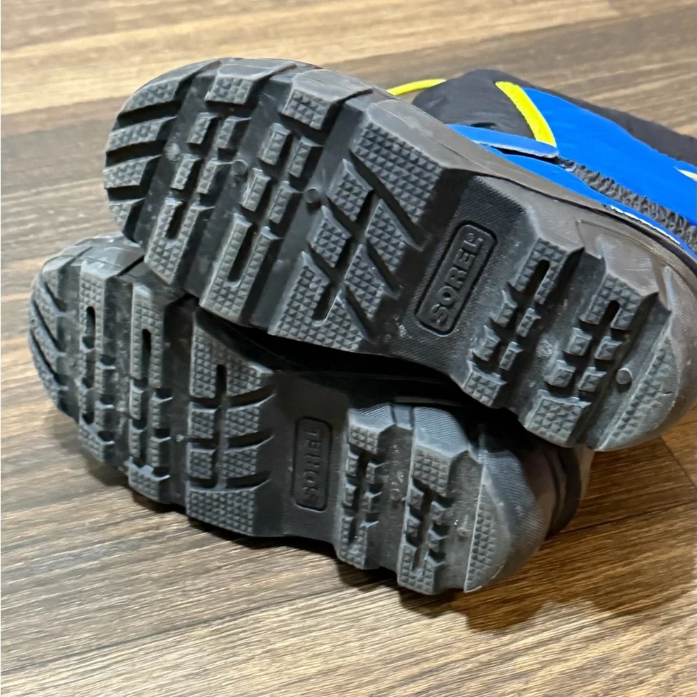 Sorel Kids Black and Blue Snow Boots with Yellow Accents